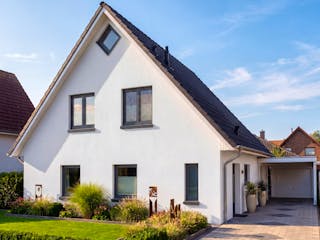 Fertighaus Satteldach 144 von AMR-Wohnbau Schlüsselfertig ab 317000€, Satteldach-Klassiker Außenansicht 2