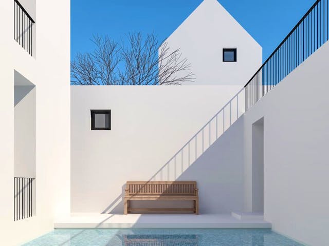 Modernes Atriumhaus mit Pool in schlichter Architektur