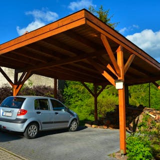 csm_Carport_bauen_holz_AdobeStock_Herrmann_5370e065cb.jpg