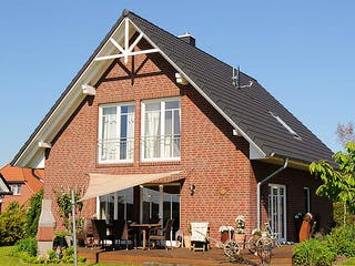 Fertighaus Imke (KfW-Effizienzhaus 40 EE) von Dammann-Haus Schlüsselfertig ab 323700€, Satteldach-Klassiker Außenansicht 1