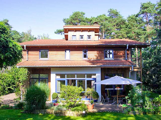 Fertighaus Margret (KfW-Effizienzhaus 40 EE) von Dammann-Haus Schlüsselfertig ab 508800€, Pultdachhaus Außenansicht 1