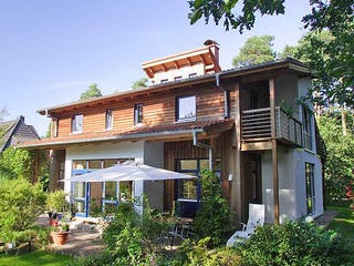 Fertighaus Margret (KfW-Effizienzhaus 40 EE) von Dammann-Haus Schlüsselfertig ab 508800€, Pultdachhaus Außenansicht 3