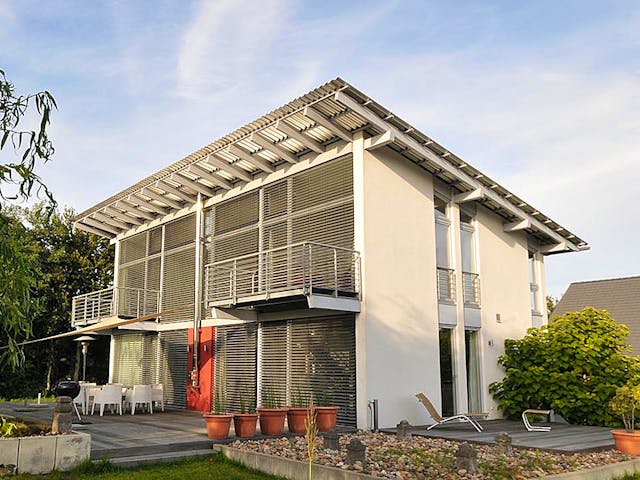 Fertighaus Sabine (KfW-Effizienzhaus 40 EE) von Dammann-Haus Schlüsselfertig ab 444200€, Pultdachhaus Außenansicht 1