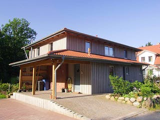 Fertighaus Wieke (KfW-Effizienzhaus 40 EE) von Dammann-Haus Schlüsselfertig ab 492100€, Stadtvilla Außenansicht 4