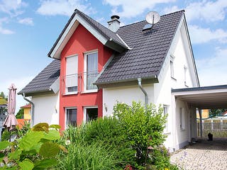 Massivhaus ICON 3 mit Quergiebel von Dennert Massivhaus Ausbauhaus ab 247288€, Satteldach-Klassiker Außenansicht 2