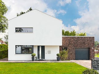 Massivhaus Bauhaus-Modern Classic 140 von ECO System HAUS Schlüsselfertig ab 358000€, Satteldach-Klassiker Außenansicht 3