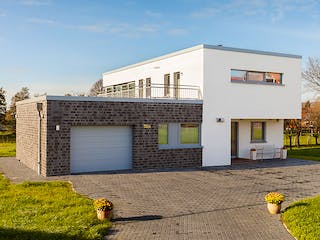 Massivhaus Bauhaus-Modern Classic 180 von ECO System HAUS Schlüsselfertig ab 513400€, Cubushaus Außenansicht 2