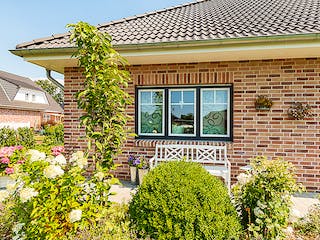 Massivhaus Winkelbungalow 135 von ECO System HAUS Schlüsselfertig ab 305000€, Bungalow Außenansicht 3