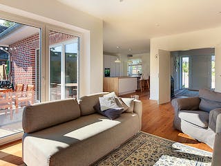 Massivhaus Winkelbungalow 135 von ECO System HAUS Schlüsselfertig ab 305000€, Bungalow Innenansicht 1