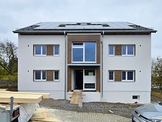 Fertighaus Mehrfamilienhaus mit sechs Wohneinheiten von Frammelsberger Holzbau - Mehrfamilienhäuser, Außenansicht 1