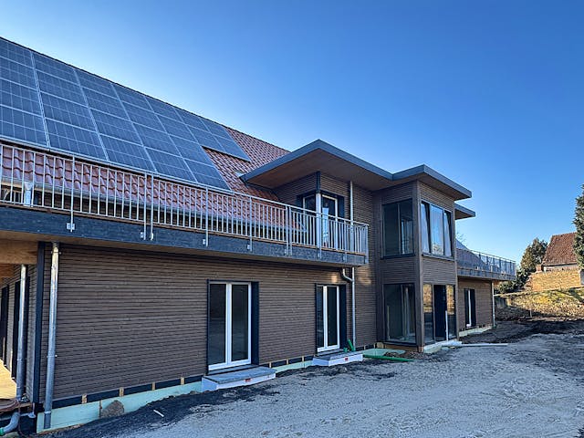 Fertighaus Mehrfamilienhaus mit sieben Wohneinheiten von Frammelsberger Holzbau - Mehrfamilienhäuser, Außenansicht 1