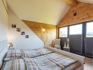 Blockhaus Köterbergblick von Fullwood Wohnblockhaus Bausatzhaus ab 250000€, Blockhaus Innenansicht 10