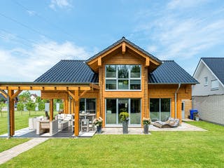 Blockhaus Münsterland von Fullwood Wohnblockhaus Ausbauhaus ab 260000€, Blockhaus Außenansicht 1