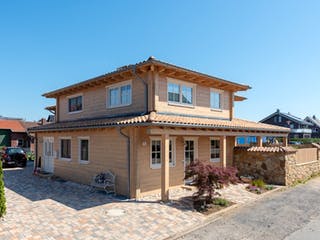 Blockhaus Provence von Fullwood Wohnblockhaus Ausbauhaus ab 660000€, Blockhaus Außenansicht 2