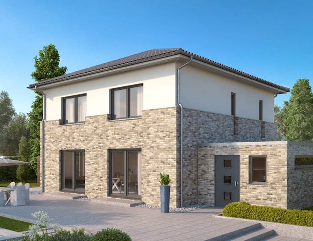 Fertighaus-Stadtvilla mit Klinker- und Putzfassade und Garage von GUSSEK-HAUS