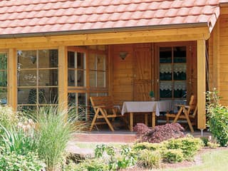 Blockhaus B162 Sutter von Frammelsberger Holzbau, Blockhaus Außenansicht 2