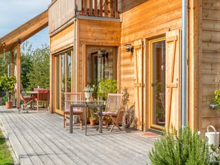 Blockhaus B155 Krank von Frammelsberger Holzbau, Blockhaus Außenansicht 6