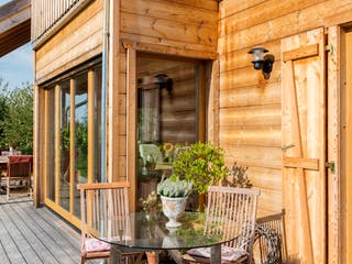 Blockhaus B155 Krank von Frammelsberger Holzbau, Blockhaus Außenansicht 8