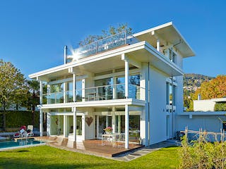 Fertighaus HUF Haus mit Flachdach - Beispiel 1 von HUF HAUS, Fachwerk Außenansicht 2