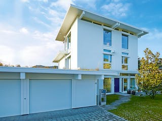 Fertighaus HUF Haus mit Flachdach - Beispiel 1 von HUF HAUS, Fachwerk Außenansicht 3