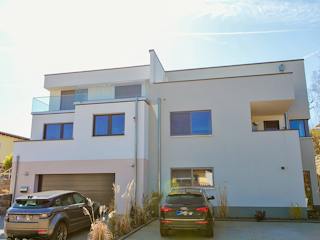 Massivhaus Flachdachhaus am Hang von Massivhaus Rhein Lahn, Cubushaus Außenansicht 1