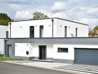 Massivhaus Stylisches Flachdachhaus von Massivhaus Rhein Lahn, Cubushaus Außenansicht 1