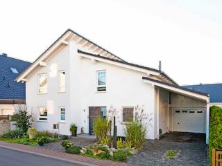 Massivhaus Traumhaftes Wohnen von RheinMassiv Massivhäuser, Pultdachhaus Außenansicht 2