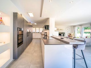 Massivhaus Massivhaus Thumann mit Satteldach und Sauna von MYMassivhaus, Satteldach-Klassiker Innenansicht 3