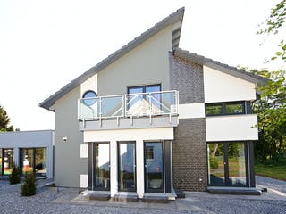 Fertighaus Musterhaus Kaarst von OKAL Haus Schlüsselfertig ab 521900€, Pultdachhaus Außenansicht 2