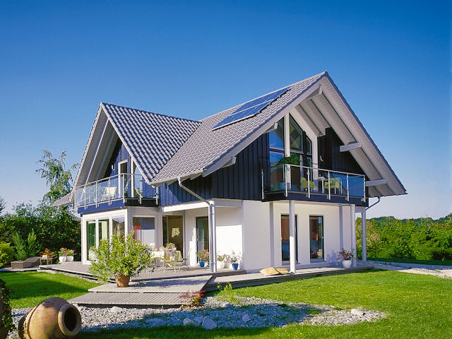 Fertighaus E 15-205.1 - Haus mit Wintergarten von SchwörerHaus Schlüsselfertig ab 588340€, Außenansicht 1