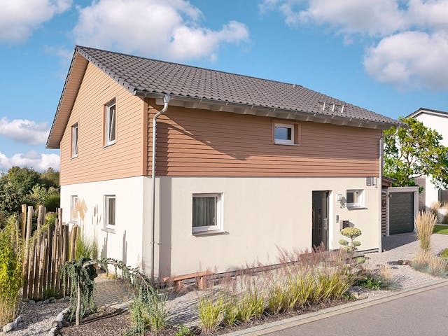 Fertighaus E 15-150.6 - Aktionshaus mit Sonneninsel von SchwörerHaus - Österreich Schlüsselfertig ab 385770€, Außenansicht 1