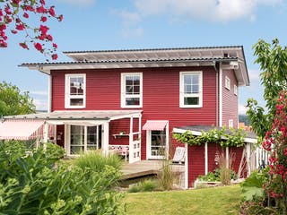 Fertighaus E 20-168.1 - Fertighaus im skandinavischen Landhausstil & Hampton-Flair von SchwörerHaus - Österreich, Außenansicht 4