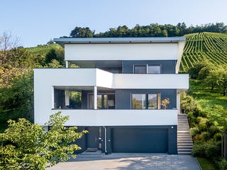 Fertighaus E 20-222.1 - Villa in Hanglage von SchwörerHaus - Österreich Schlüsselfertig ab 925430€, Cubushaus Außenansicht 3