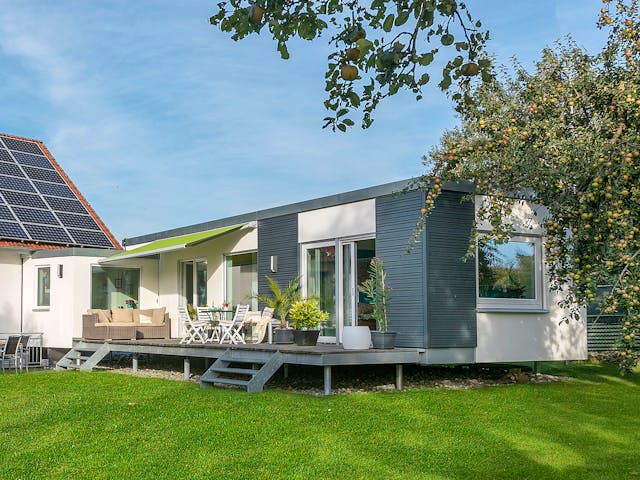 Fertighaus F 10-043.13 - Wohnmodul FlyingSpace als Anbau von SchwörerHaus Schlüsselfertig ab 188997€, Bungalow Außenansicht 1