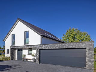 Massivhaus Haus Ginsterweg von Splietker Bau, Satteldach-Klassiker Außenansicht 3