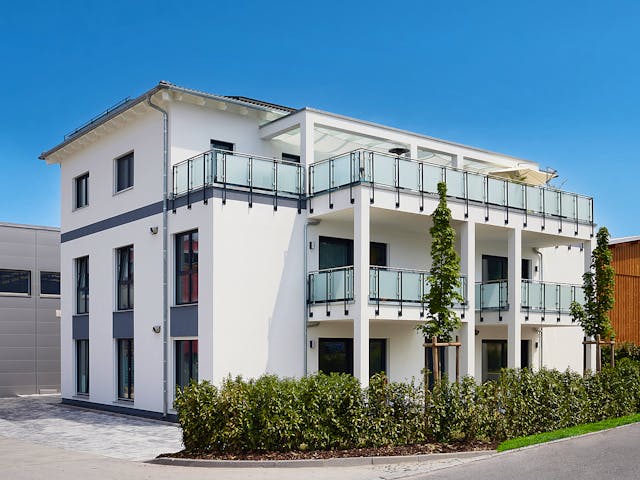 Fertighaus Vielseitiger Gewerbebau mit Mitarbeiter-Wohnungen von Bau-Fritz - Mehrfamilienhäuser, Stadtvilla Außenansicht 1