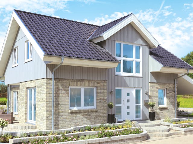 Fertighaus Westerland - Winkelhaus im Landhausstil von Danhaus Deutschland Schlüsselfertig ab 474901€, Außenansicht 1