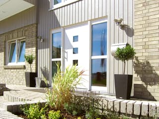 Fertighaus Westerland - Winkelhaus im Landhausstil von Danhaus Deutschland Schlüsselfertig ab 474901€, Außenansicht 3