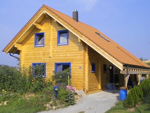 Blockhaus Wolfenbrück von Rems-Murr-Holzhaus Ausbauhaus ab 220880€, Blockhaus Außenansicht 1