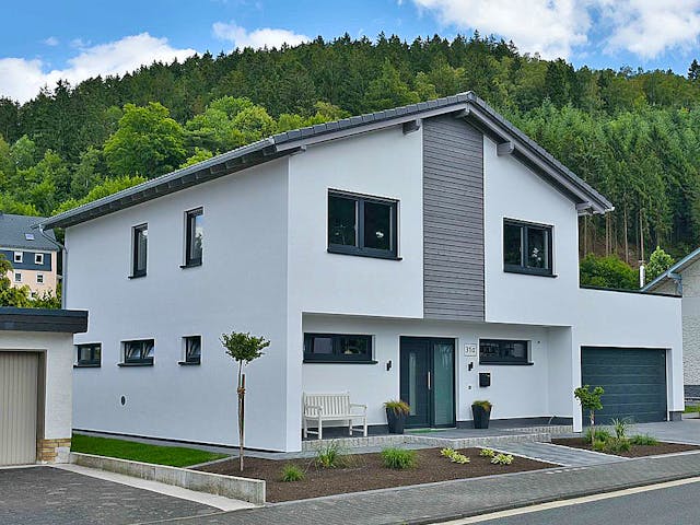 Fertighaus Haus Nübold-Bracht von Wiese und Heckmann, Satteldach-Klassiker Außenansicht 1 Fertighaus Haus Nübold-Bracht von Wiese und Heckmann, Satteldach-Klassiker Außenansicht 1